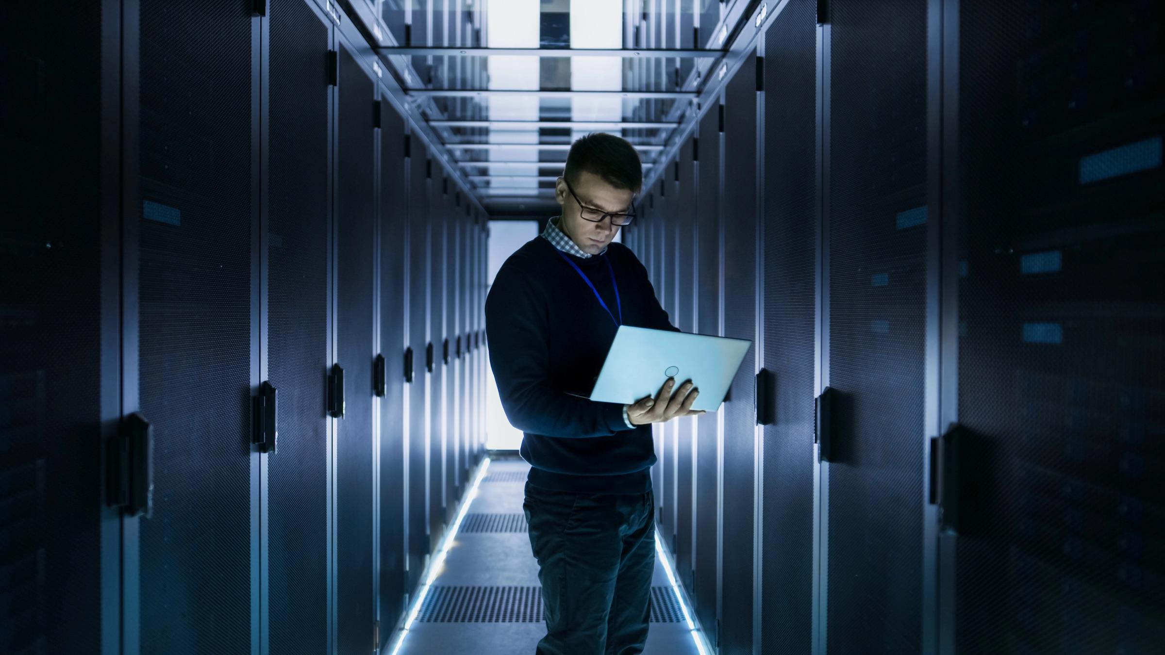 IT professional working in a modern technology workspace